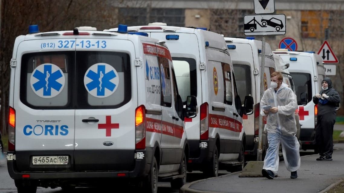 Ambulances queue outside Saint Petersburg's Pokrovskaya hospital, where patients suffering from the coronavirus disease are treated, on December 21, 2020. (AFP)