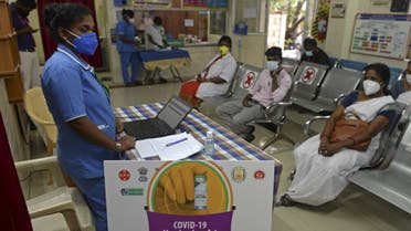 Health officials take part in dry run or a mock drill for Covid-19 coronavirus vaccine delivery at a primary health centre in Chennai on January 2, 2021. (AFP)