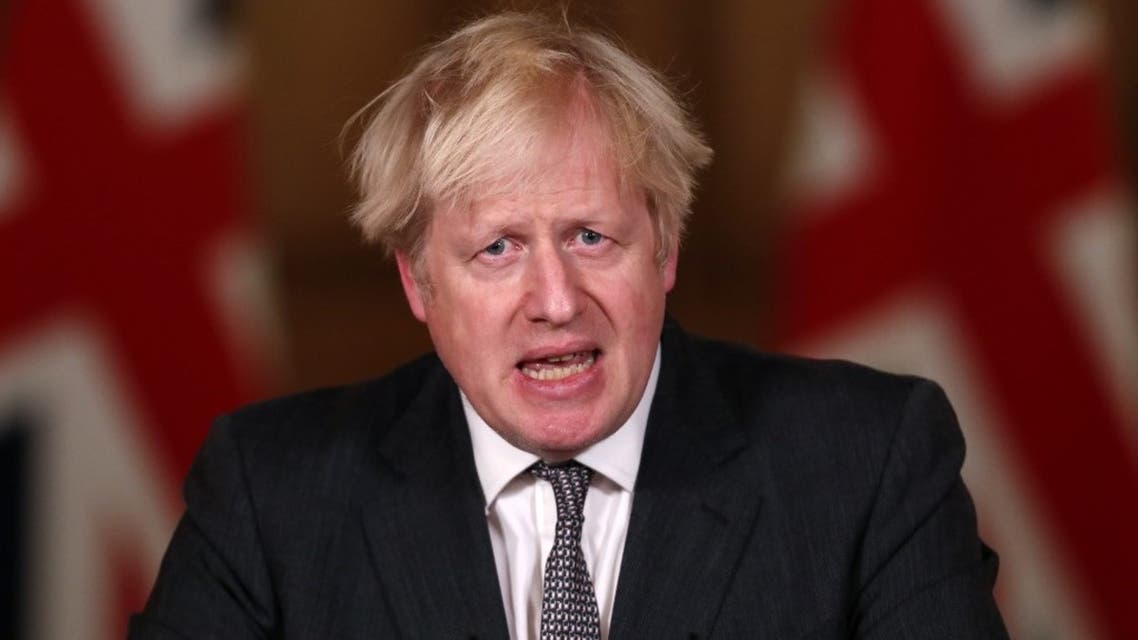 Britain's Prime Minister Boris Johnson speaks during a virtual press conference inside 10 Downing Street in central London on December 30, 2020. (AFP)