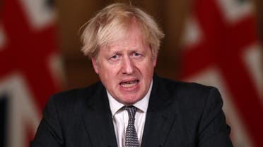 Britain's Prime Minister Boris Johnson speaks during a virtual press conference inside 10 Downing Street in central London on December 30, 2020. (AFP)