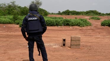 A Nigerien police officer stands guard in the Kouré Reserve, about 60 km from Niamey on August 21, 2020. (AFP)