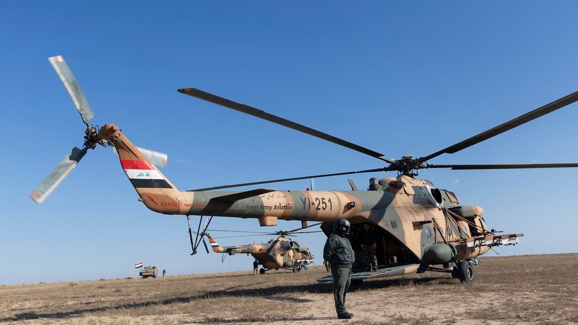 Army units are deployed during the military operations of the Iraqi army Seventh Brigade, at the start of the eighth phase of the operation, in Anbar, Iraq. (AP)