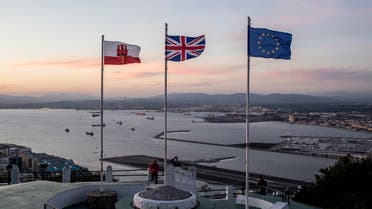 Gibraltar, British and EU flags on the upper rock at the British territory of Gibraltar, Friday Jan. 31, 2020. Britain officially leaves the European Union on Friday after a debilitating political period that has bitterly divided the nation since the 2016 Brexit referendum. (AP Photo/Javier Fergo)