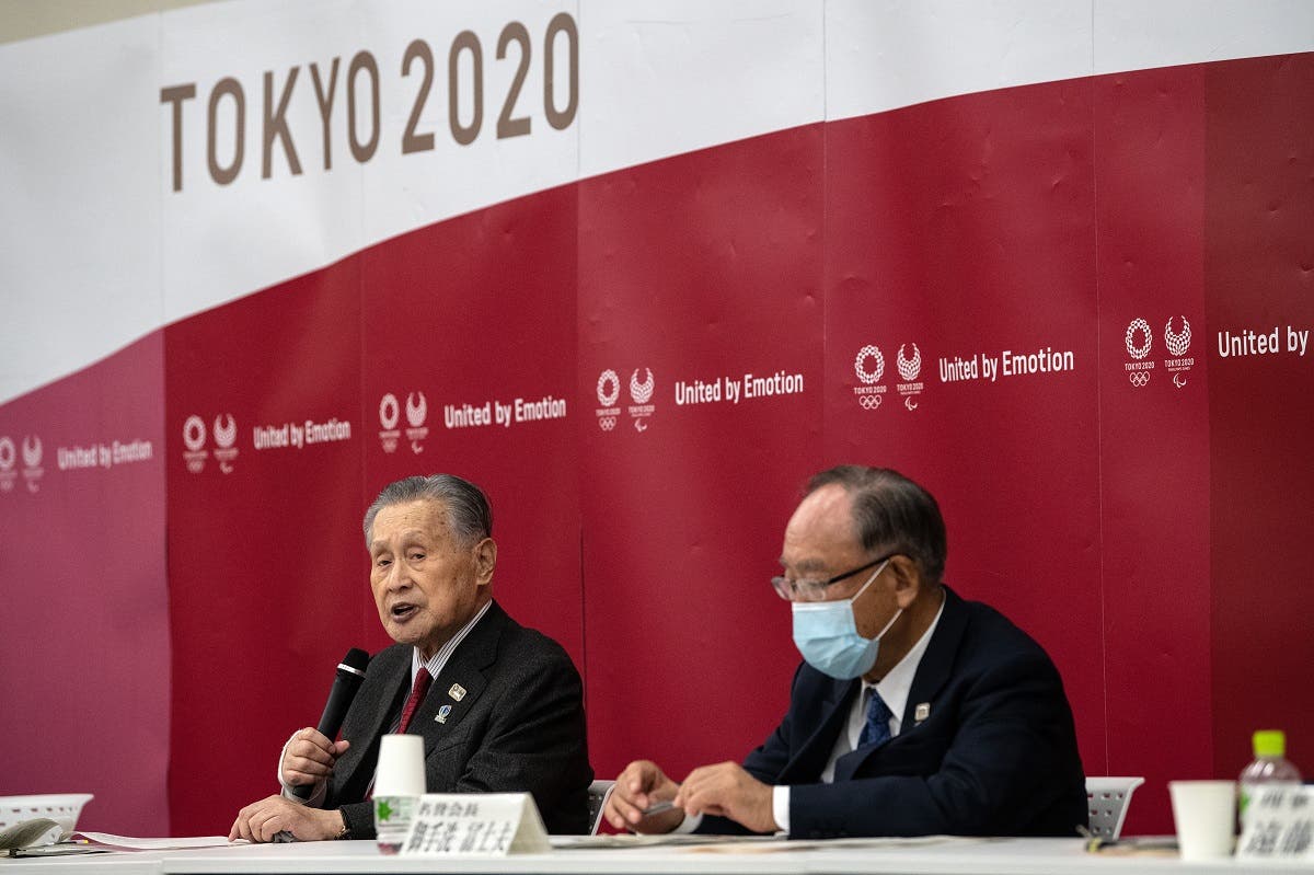 Former Tokyo 2020 President Yoshiro Mori (L) speaks during the opening remarks session of the Tokyo 2020 Olympics executive board meeting in Tokyo on December 22, 2020. (AP)