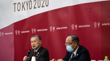 Tokyo 2020 President Yoshiro Mori (L) speaks during the opening remarks session of the Tokyo 2020 Olympics executive board meeting in Tokyo on December 22, 2020. (AP)