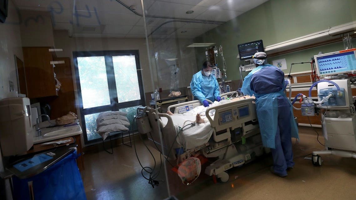Nurses care for a coronavirus COVID-19 patient in the intensive care unit (I.C.U.) at Regional Medical Center on May 21, 2020 in San Jose, California. (Getty Images via AFP)