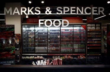 Empty shelves are seen behind a M&S logo at a Marks & Spencer food store in Paris, France, January 5, 2021. (Reuters/Gonzalo Fuentes)