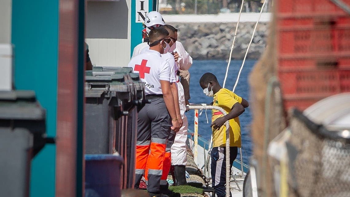 A file photo shows migrant arrives at the Port of Arguineguin after being rescued by the Spanish coast guard in the Canary Island of Gran Canaria on November 23, 2020. (Desiree Martin/AFP)