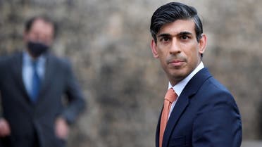 Britains Chancellor of the Exchequer Rishi Sunak looks on as he leaves following an outside broadcast interview, in London, Britain, on November 26, 2020. (Reuters)