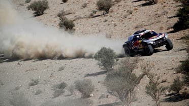 Raid Mini JCW Team’s Stephane Peterhansel and Co-Driver Edouard Boulanger in action during stage 1 on January 3, 2021, Saudi Arabia. (Reuters/Hamad I Mohammed)