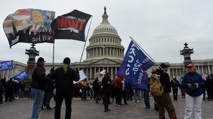 Trump supporters rally in Washington ahead of Congress meeting 