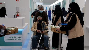 A man in a wheelchair leaving after he received dose of a coronavirus disease (COVID-19) vaccine, in Riyadh, Saudi Arabia December 17, 2020. (Reuters)