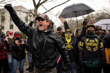 Protesters confront riot police as they gathered at the Capitol on Wednesday, Jan. 6, 2021 in Salem, Ore. Thousands of President Donald Trump's supporters caused violence and chaos in Washington while Congress attempted to vote to certify that President-elect Joe Biden won the election. (AP)