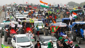 In show of strength, farmers block expressway near Indian capital to protest new laws