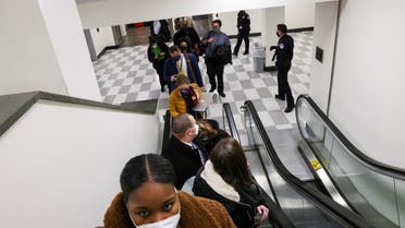 U.S. Capitol Police evacuate journalists and House press staff members from the Capitol to a connected office building, in Washington, U.S., January 6, 2021. REUTERS/Jonathan Ernst