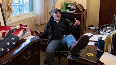Richard Barnett photographed inside Nancy Pelosi's office. (Twitter)