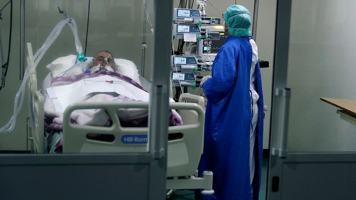 A nurse takes care of a COVID-19 patient in the intensive care unit of the Rafic Hariri University Hospital in the Lebanese capital Beirut, on November 13, 2020. (Joseph Eid/AFP)