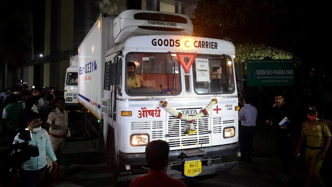 Trucks carrying first consignment of COVISHIELD, a coronavirus disease vaccine developed by AstraZeneca and Oxford University, leave from Serum Bio-Pharma Park of Serum Institute of India, for its distribution, in Pune, India, on January 12, 2021. (Reuters)
