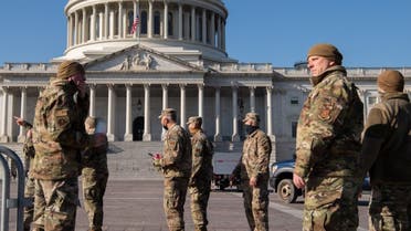 Members of the National Guard patrol outside of the US Capitol in Washington, DC, January 12, 2021. (AFP)
