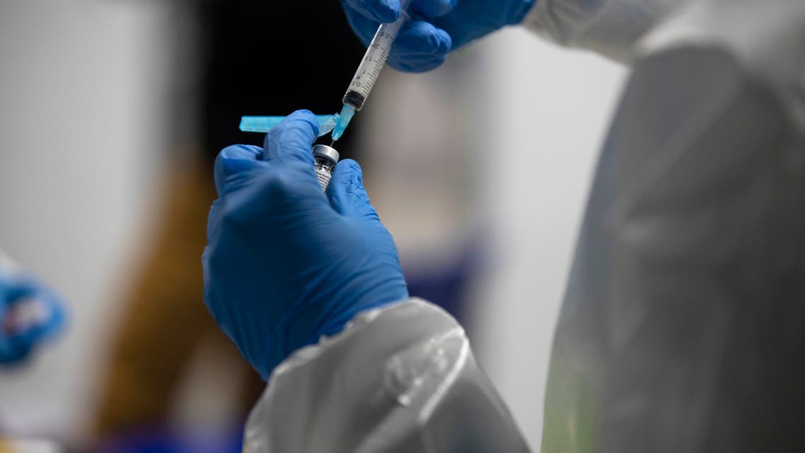 A health worker prepares the Pfizer-BioNTech COVID-19 vaccine. (AP)