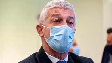 Prosecutor Nicola Morra wears a face mask to curb the spread of COVID-19 as he stands inside a specially constructed bunker hosting the first hearing of a maxi-trial against more than 300 defendants of the ‘ndrangheta crime syndicate, near the Calabrian town of Lamezia Terme, southern Italy, Wednesday, Jan. 13, 2021. (AP)