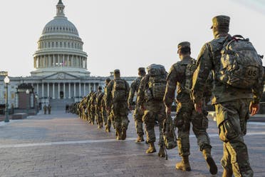 Members of the US National Guard arrive at the U.S. Capitol on January 12, 2021 in Washington, DC. (AFP)