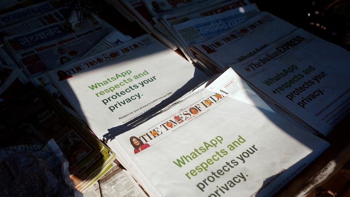 A WhatsApp advertisement is seen on the front pages of newspapers at a stall in Mumbai. (Reuters)