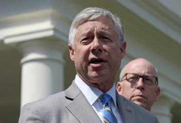Rep. Fred Upton, R-Mich., left, speaks to reporters outside the White House in Washington. (File photo: AP)