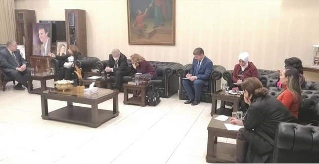 A photo of Asma al-Assad in the Office of the Minister of Education