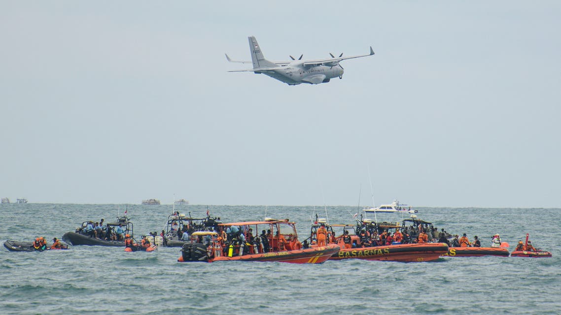 An Indonesian Military aircraft CN-235 is seen during the search and rescue operation for the Sriwijaya Air flight SJ 182, at the sea off the Jakarta coast, Indonesia, January 14, 2021 in this photo taken by Antara Foto. Antara Foto/M Risyal Hidayat/ via REUTERS ATTENTION EDITORS - THIS IMAGE WAS PROVIDED BY A THIRD PARTY. MANDATORY CREDIT. INDONESIA OUT.