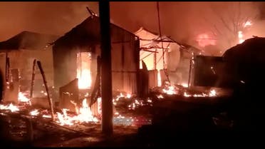 A general view during a fire outbreak in Rohingya refugee camp, in Cox's Bazar, Bangladesh January 14, 2021 in this still image obtained from a video. Mohammed Arakani/Handout via REUTERS THIS IMAGE HAS BEEN SUPPLIED BY A THIRD PARTY. MANDATORY CREDIT. NO RESALES. NO ARCHIVES.