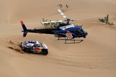 X-Raid Mini JCW Team's Stephane Peterhansel and Co-Driver Edouard Boulanger in action during stage 11. (Reuters)