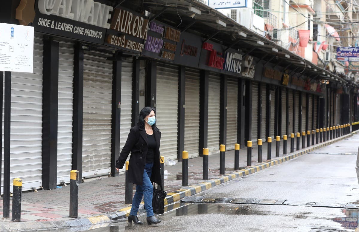 A woman wearing a face mask walks along a street, as Lebanon tightened lockdown and introduced a 24-hour curfew to curb the spread the coronavirus disease (COVID-19) in Beirut, Lebanon. (File photo: Reuters)