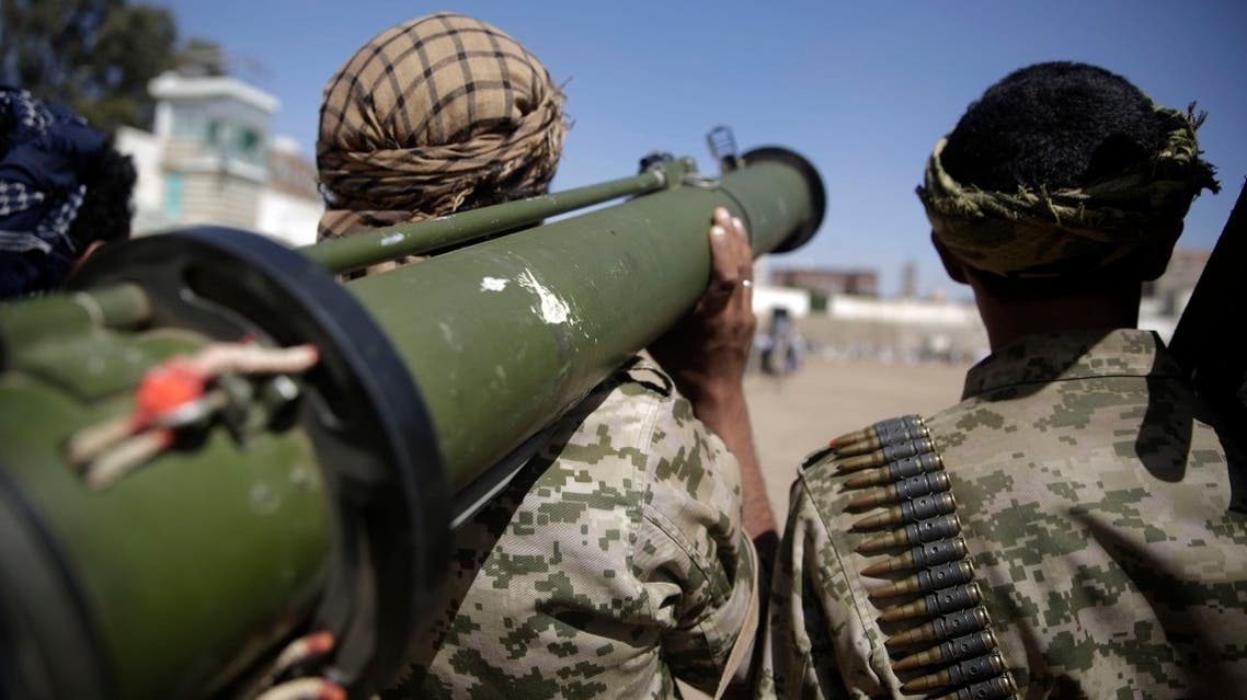 A Houthi fighter holds his weapon during a gathering aimed at mobilizing more fighters for the Iranian-backed militia, in Sanaa, Yemen, Feb. 20, 2020. (AP)