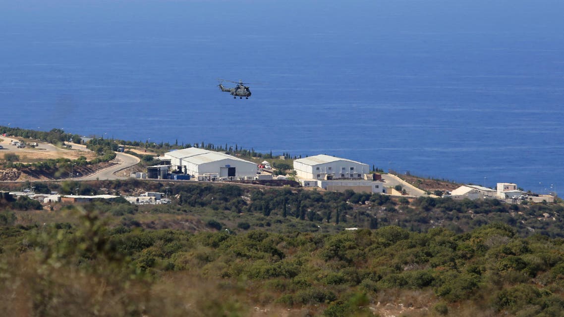 A helicopter flies over a base of the U.N. peacekeeping force, in the southern town of Naqoura, Lebanon. (File photo: AP)