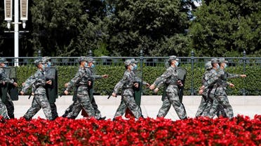 Soldiers of the People's Liberation Army (PLA) march outside the Great Hall of the People in Beijing. (Reuters)