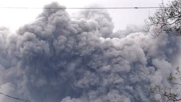 In this photo released by Indonesia's National Disaster Mitigation Agency (BNPB) Mount Semeru spews volcanic material during an eruption in Lumajang, East Java, Indonesia, Saturday, Jan. 16, 2021. The highest volcano on Indonesia's most densely populated island of Java, spewed hot clouds as far away as 4.5 kilometers (nearly 3 miles) on Saturday. (National Disaster Mitigation Agency via AP)