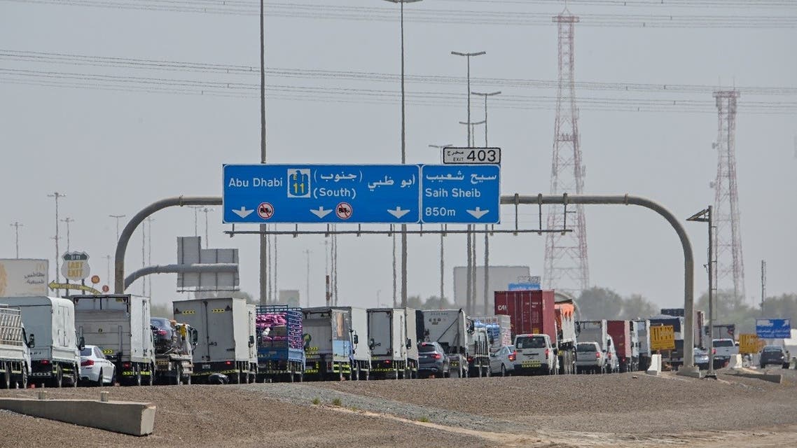 Emirati security forces man a checkpoint at the entrance of Abu Dhabi, on the highway linking Dubai to the capital. (AFP)