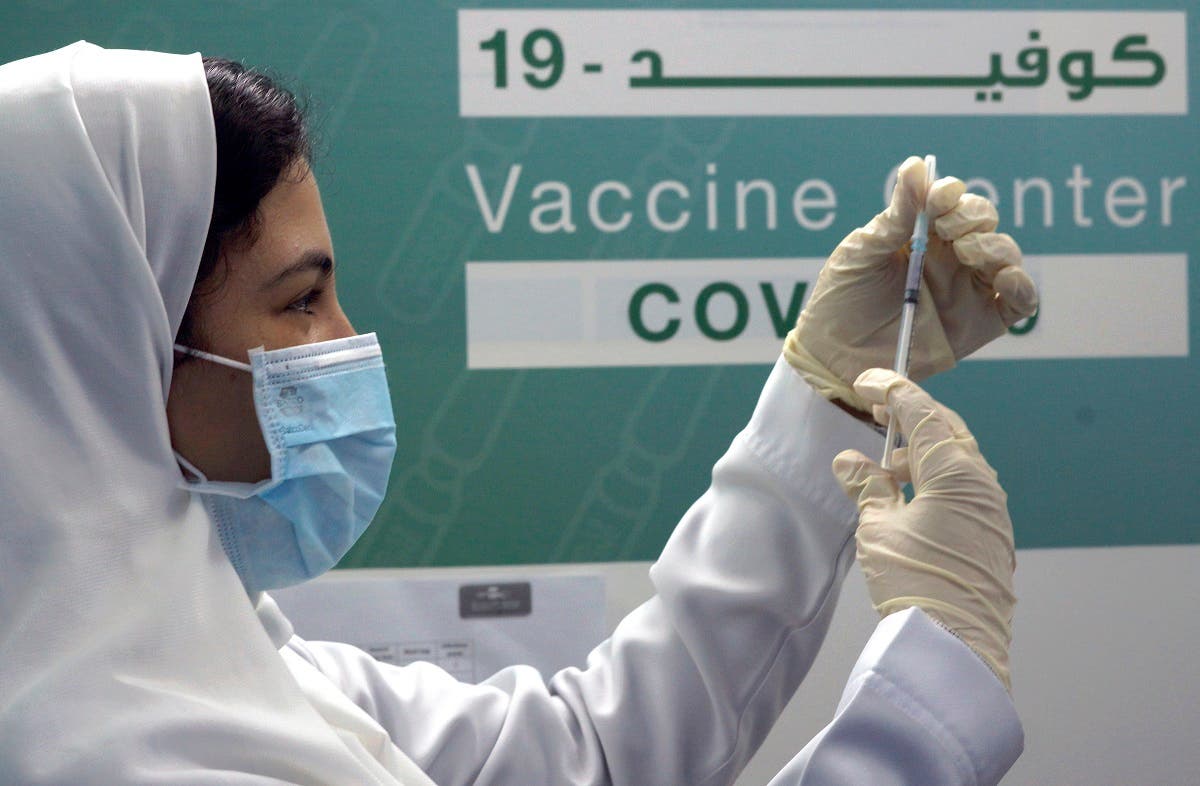 Saudi physician Hala Alkattan prepares to inject a Pfizer vaccine at a new coronavirus vaccination center, at the Jeddah old airport, Saudi Arabia. (File photo: AP)