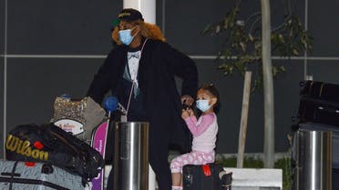 American tennis player Serena Williams and her daughter Alexis Olympia Ohanian Jr. arrive before heading straight to quarantine for two weeks isolation ahead of her Australian Open. (AFP)