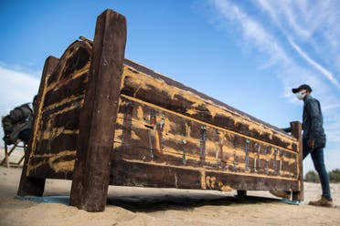 An adorned wooden sarcophagus is displayed at Egypt’s Saqqara necropolis south of Cairo, on January 17, 2021. (Khaled Desouki/AFP)
