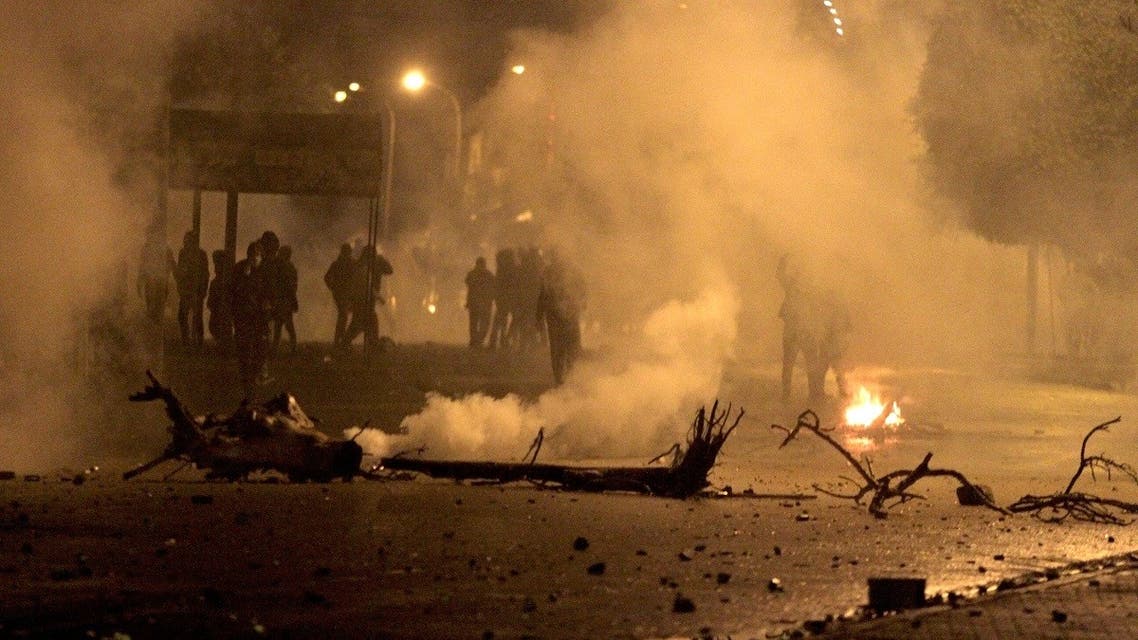 Demonstrators clash with security forces during a protest in the Tunisian city of Siliana, the capital of the governorate of the same name, about 130 kms southwest of the capital Tunis, on January 16, 2021. (Feouzi Dridi/AFP)