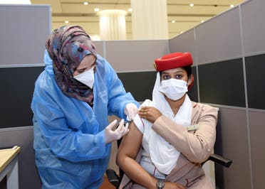 Emirates flight attendant gets the COVID-19 (coronavirus) vaccine in Dubai, United Arab Emirates. (Emirates)