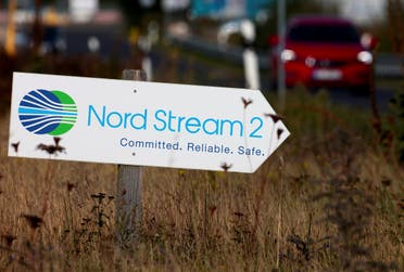 A road sign directs traffic towards the Nord Stream 2 gas line landfall facility entrance in Lubmin, Germany, Sept. 10, 2020. (Reuters)