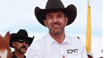 US elected state official arrested after vowing to travel Washington DC with rifle