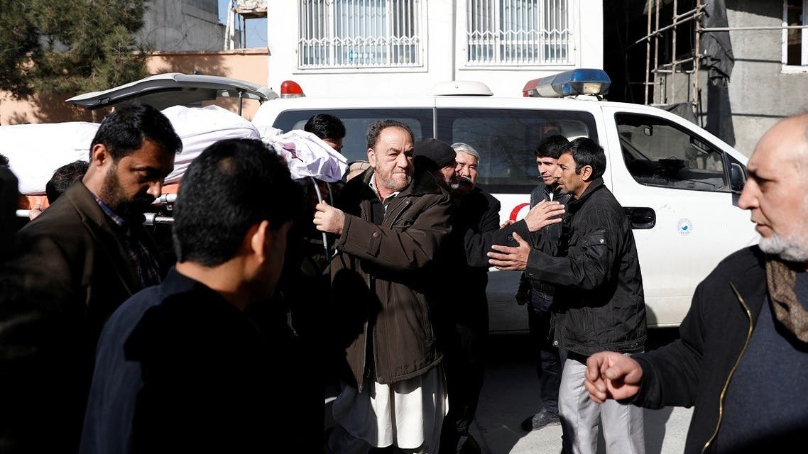 Relatives carry the body of one of the female judges shot dead by unknown gunmen in Kabul, Afghanistan, on January 17, 2021. (Reuters)