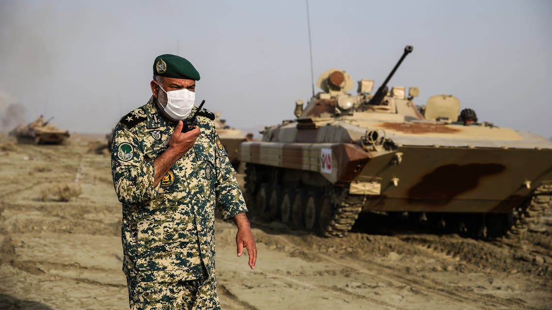 This handout photo provided by the Iranian Army office on January 19, 2021, shows Iran's Army Ground Forces taking part in a military drill in the coastal region of Makran in southeastern Iran.