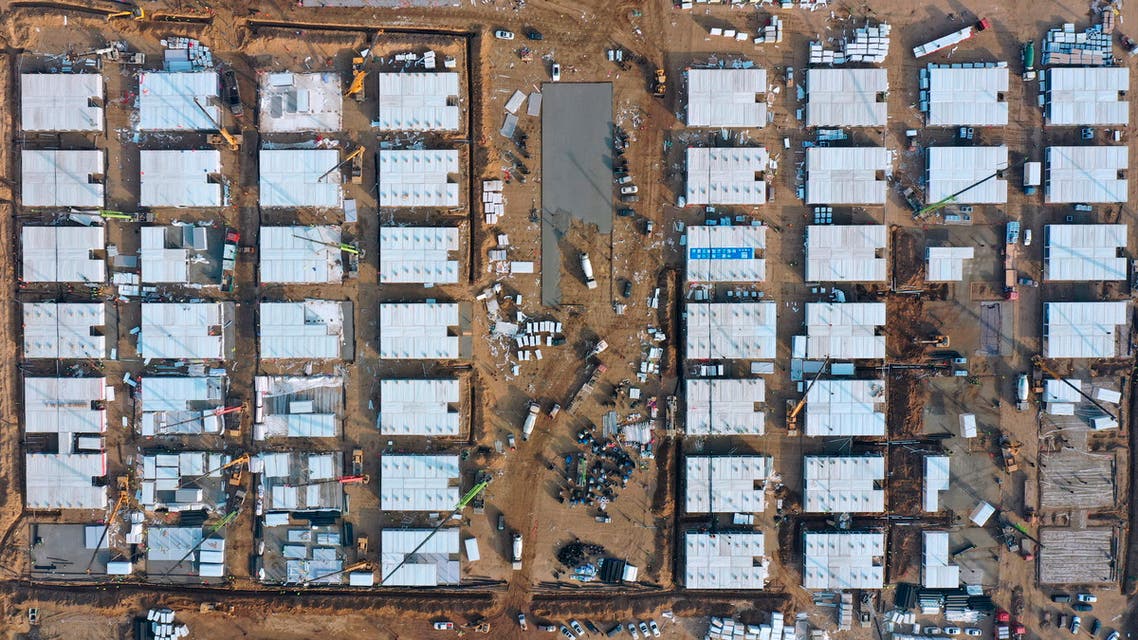 In this aerial photo released by China's Xinhua News Agency, workers build a large centralized quarantine facility capable of holding several thousand people in Shijiazhuang in northern China's Hebei Province. (AP)