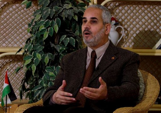 Hamas spokesman Fawzi Barhoum pauses during an interview with The Associated Press in Gaza City, Tuesday, Feb. 7, 2012. Barhoum said Tuesday Gaza's ruling Hamas movement is willing to cede power to an interim unity government led by its longtime rival, Palestinian President Mahmoud Abbas.(AP Photo/Hatem Moussa)