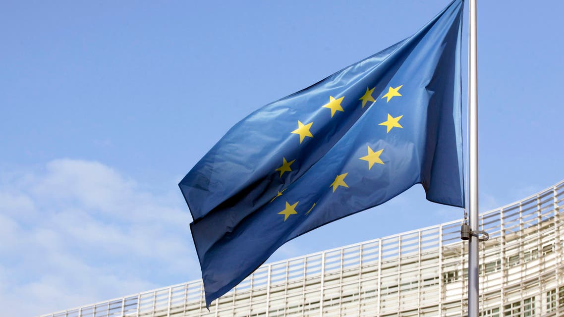 A flag of the European Union can be seen fluttering outside the European commission headquarters in Brussels. (AFP)